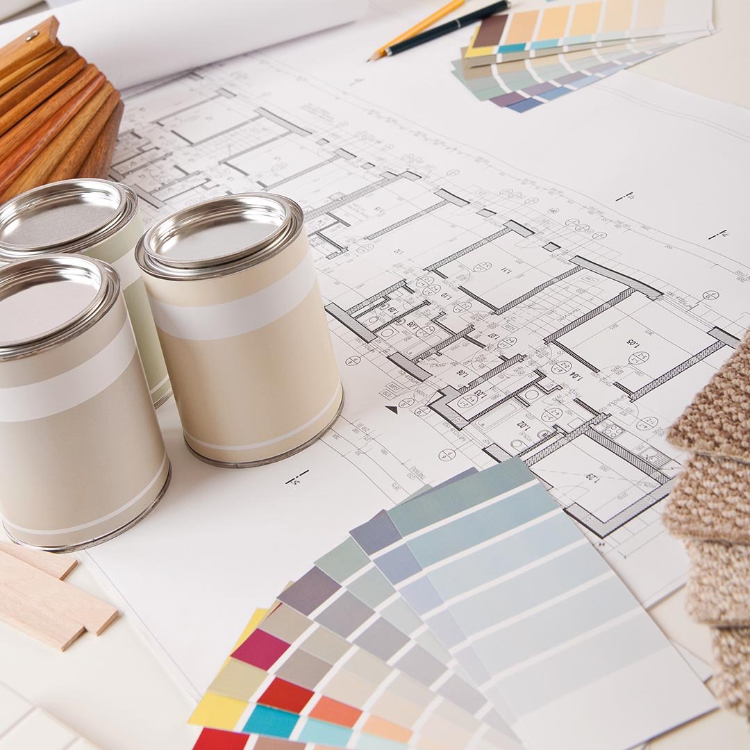interior design samples on a table with blueprints