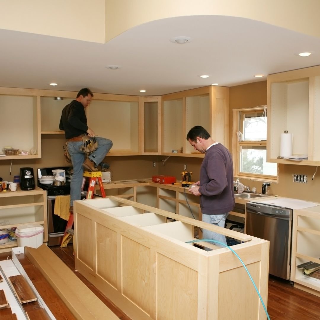 professionals installing new kitchen